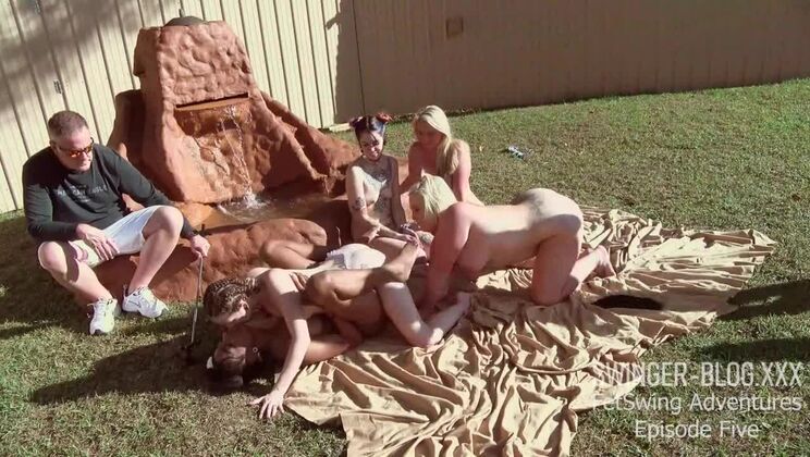 Horny babes licking and fucking toys in outdoor lesbian orgy