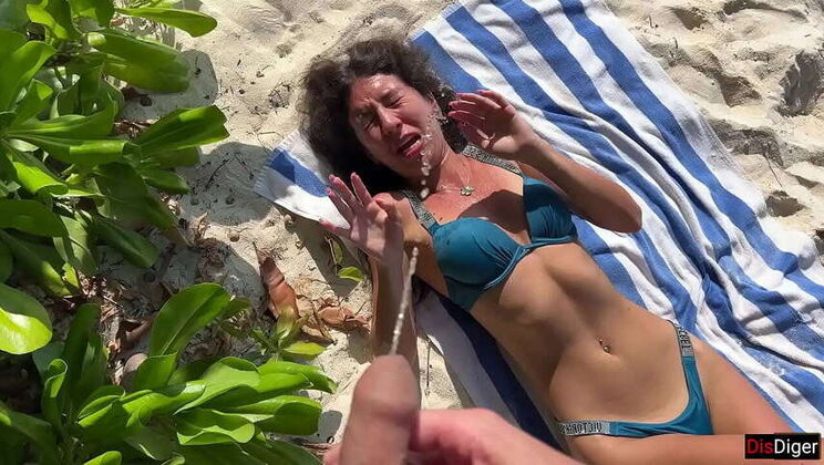 Girl Caught Peeing on Public Beach - She Got a Surprise Soaking