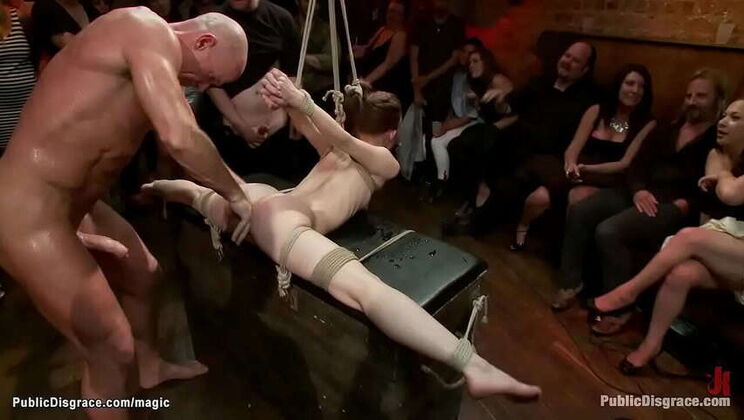 Flexible bondage slave takes on multiple partners in public hardcore encounter