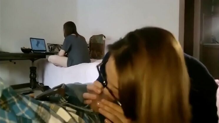 Teen Student Gets Secret Blowjob From Friend While Playing Computer