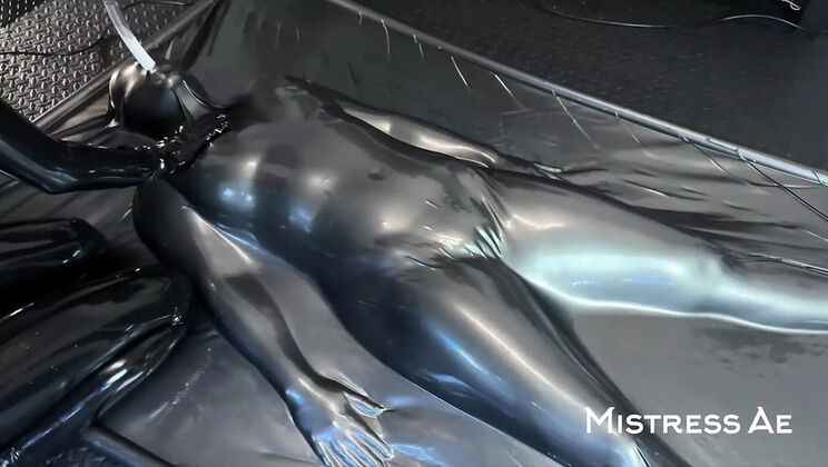 MistressAe Dominates Shannon Huxley in Tight Latex Catsuit - BDSM Lesbian Femdom